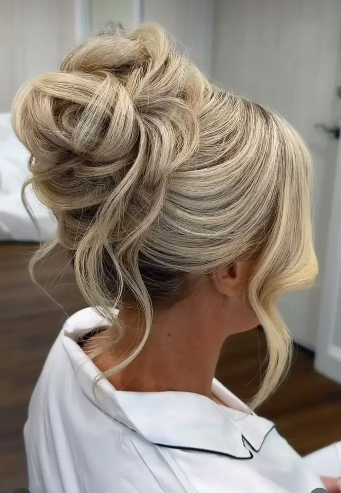 Elegant upstyle and chignon by Glam On Call